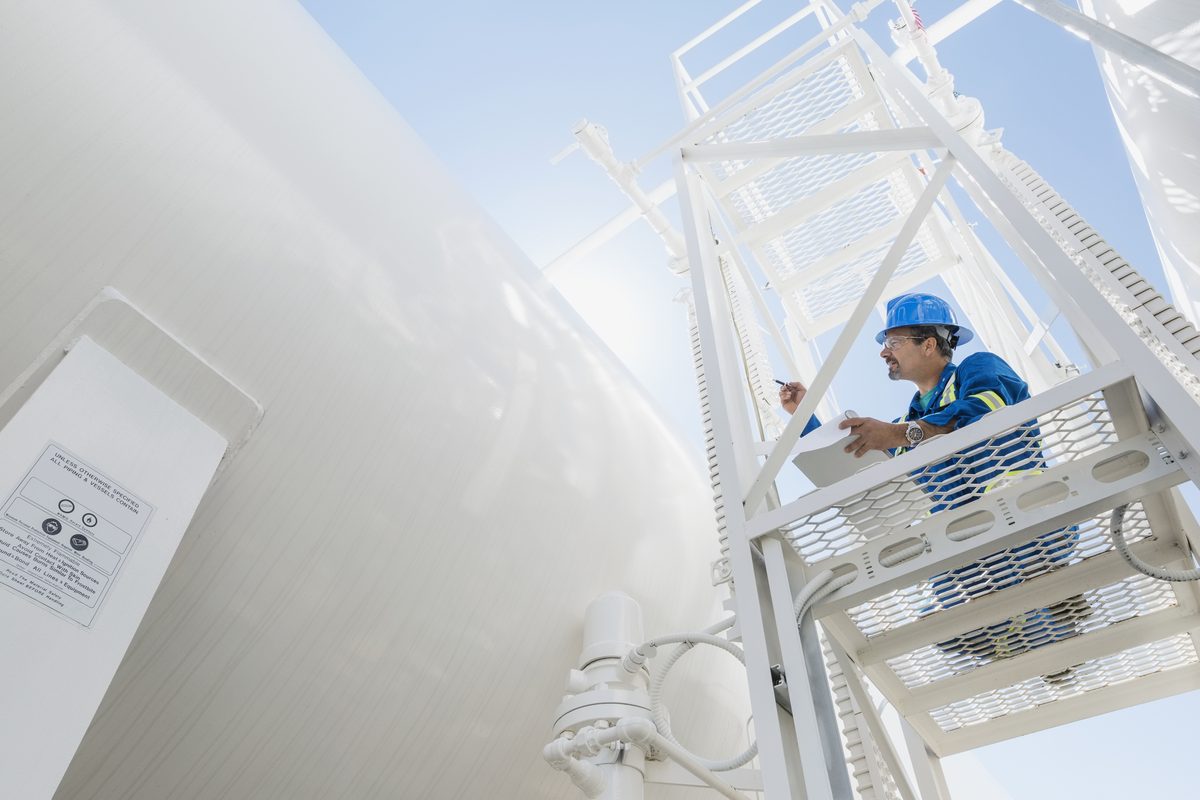 Engineer inspecting gas line
